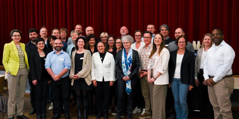 Happy reunion in Bern: workshop participants gather for a group photo